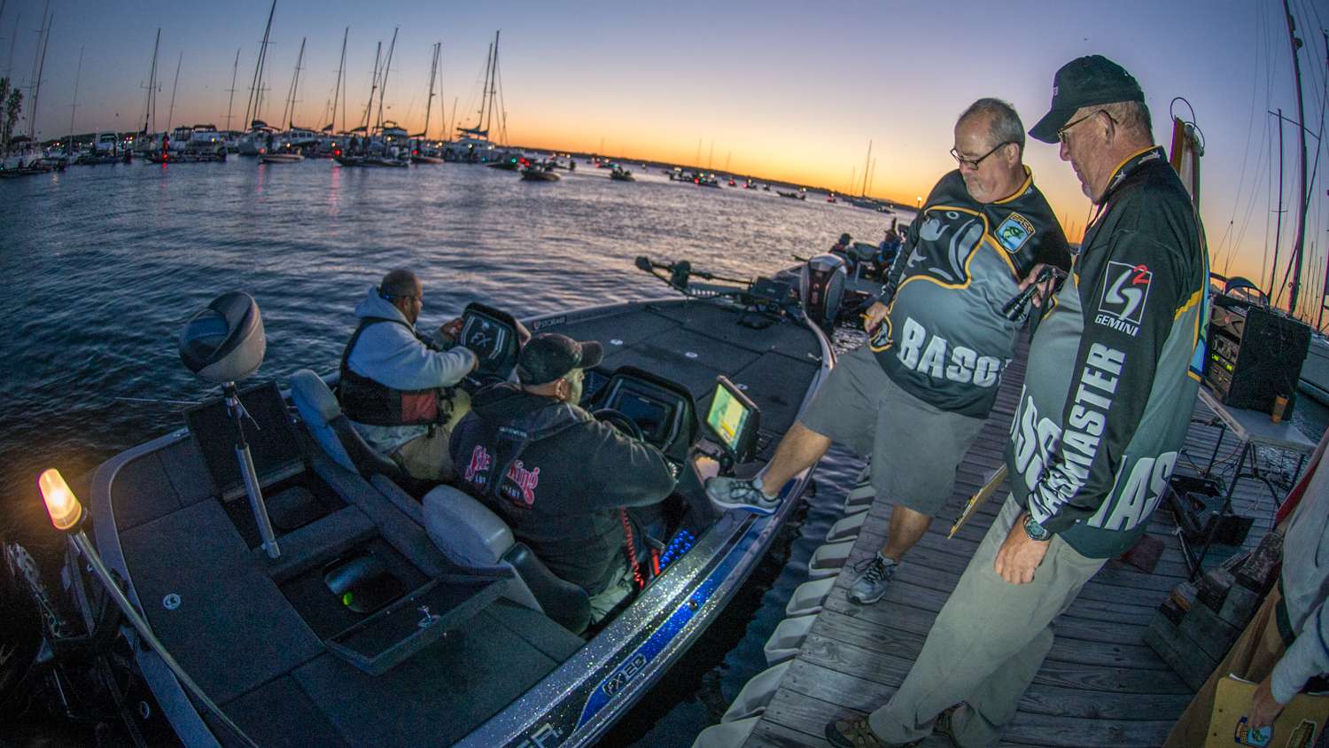 Bassmaster staff check the anglers' livewells and kill switches. 