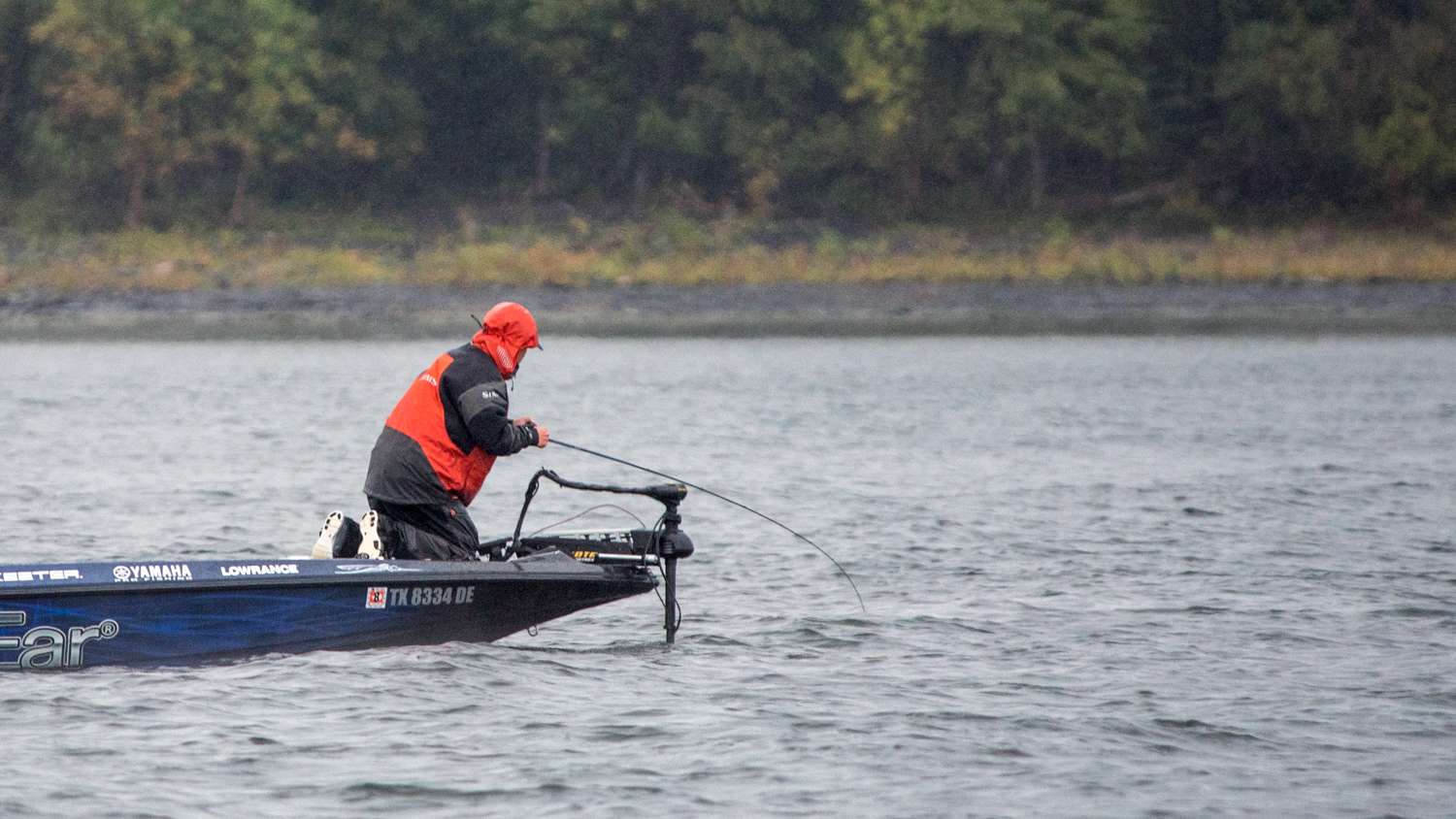 Alton steers the fish around his trolling motor and away from the prop. 