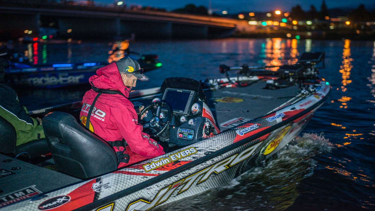 Edwin Evers puts his boat in gear as he heads out to fish Day 3. 