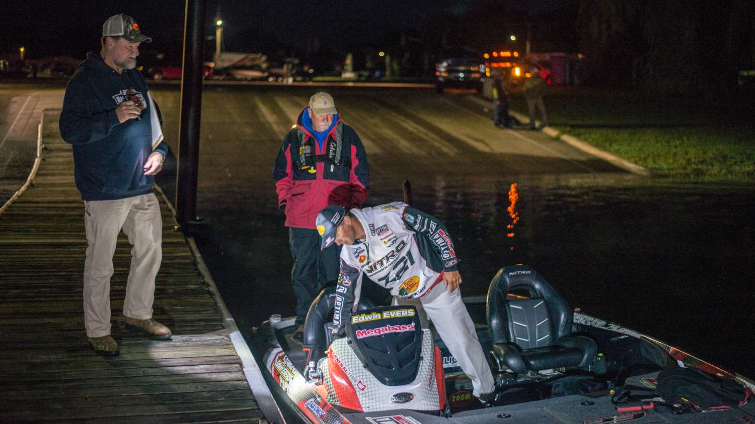 Edwin Evers launches his boat and does a quick boat check with Bassmaster staff.  
