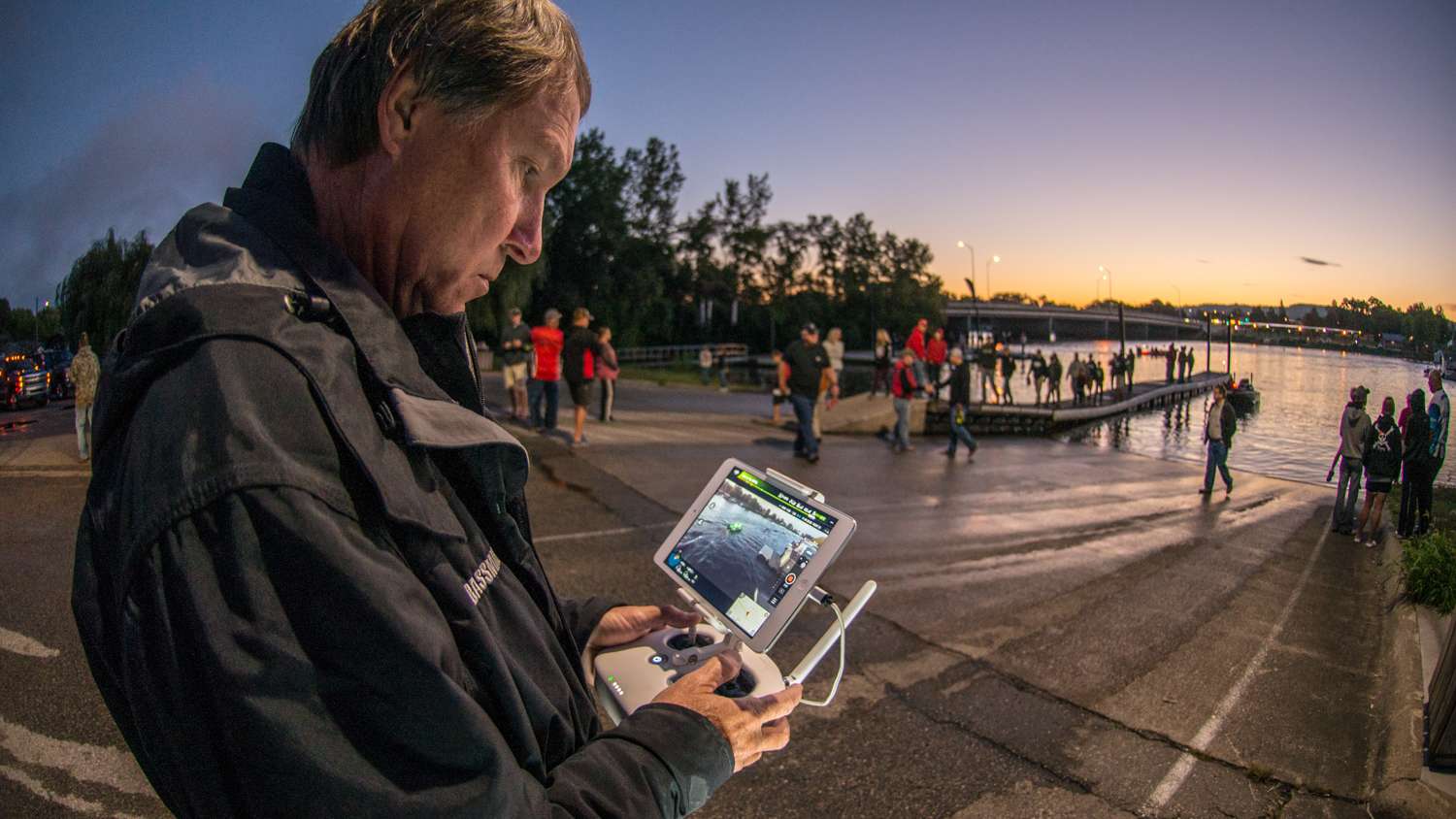 As anglers make the slow idle down the river and out of the take off area Bassmaster cameraman Carey follows them from the sky via drone.