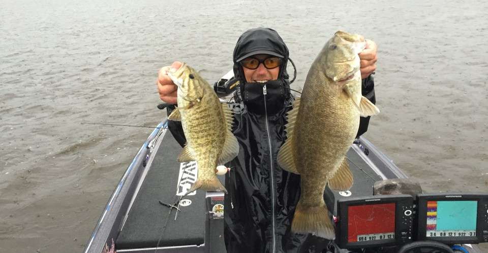 Seth Feider shows off one of his critical Day 2 culls during the Plano Bassmaster Elite at the Mississippi River.