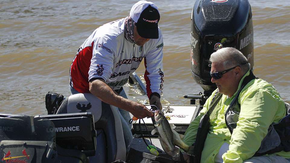 Phoenix boats owner Gary Clouse bags up his fish after Day 1.