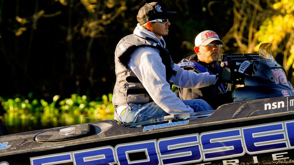 Jay Brainard took a perch on the back of his seat to help see stumps in front of his boat. 