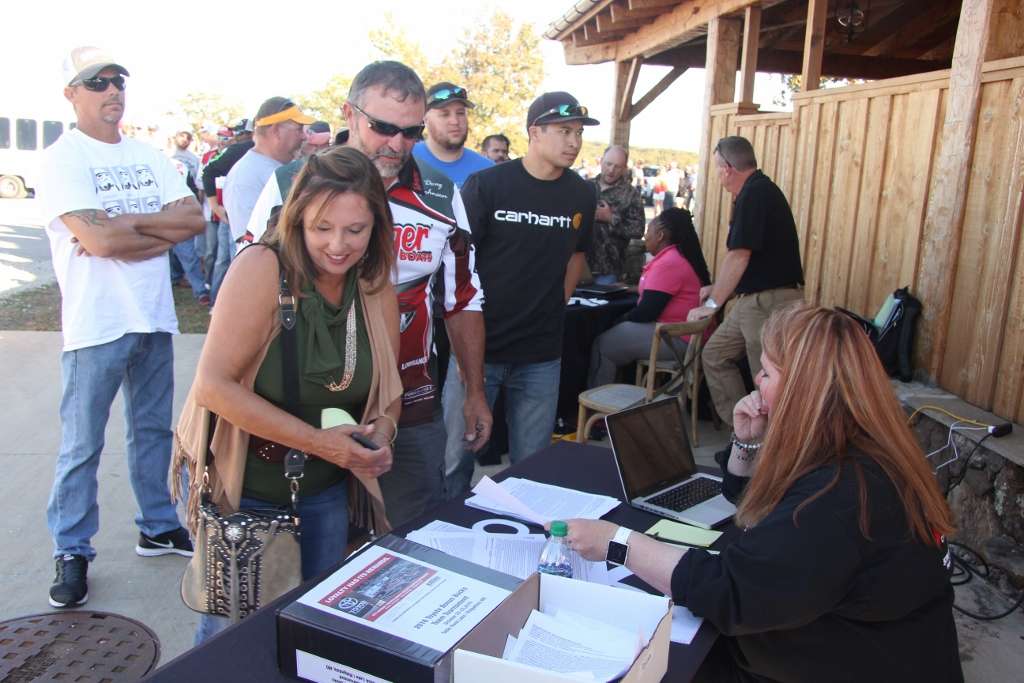 Kendell Callaway Mooney (sitting right) is the primary daily contact for the highly successful Bonus Bucks program that was launched in 2008. And fittingly, sheâs among the very first to greet anglers.