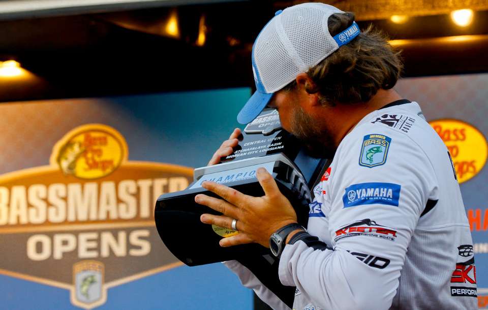 The obligatory trophy kiss.