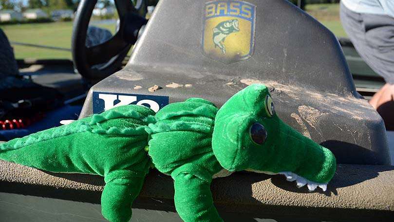The origin of the plush toy alligator is traced back to Lake Toho in Florida. âI basically got attacked by a gator nearly long as the boat,â he said. âI used a push pole to push it out of the way.â Given to Hamilton by a friend, the mascot rides along with him as a reminder of just how shallow his boat will run.