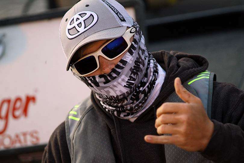 What usually is worn to protect the face from wind burn and chill is used otherwise here. This protection is worn to cover the mouth from mosquitoes, very big mosquitoes. 