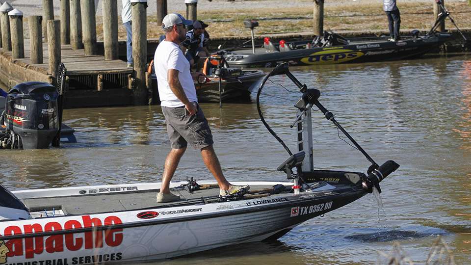 Clark Reehm pulls his trolling motor up as he finds a parking spot to weigh his fish.