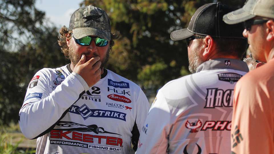 Cliff Crochet and Greg Hackney talk backstage as they both caught enough to fish the final day in the Top 12.