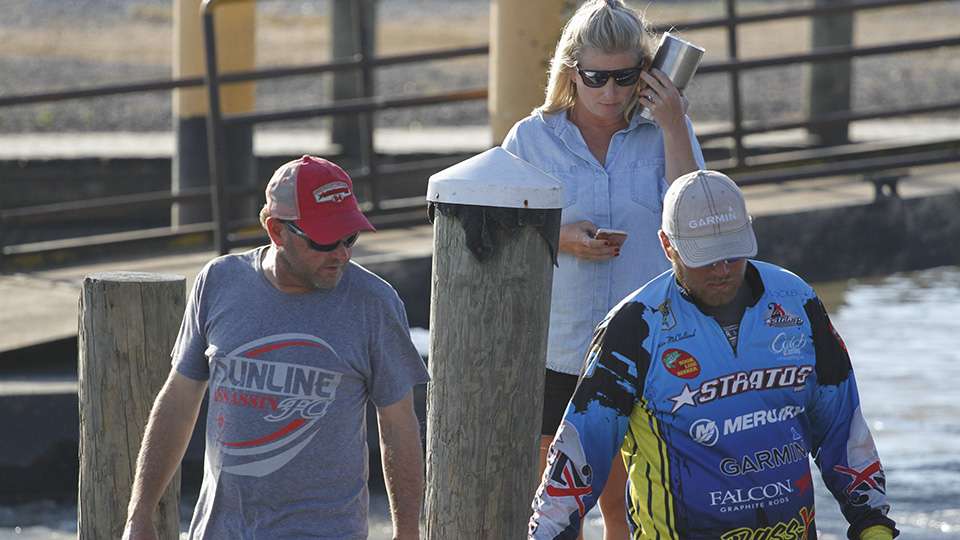 The McClelland's (Elite Series pro Mike, wife Stacey and son Justin) hang out as they wait for Justin to bag his catch.