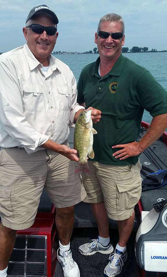 Senator Ken Horn caught a Lake St. Clair smallmouth bass with Michigan DNR bass tournament liaison and fisheries biologist Tom Goniea.