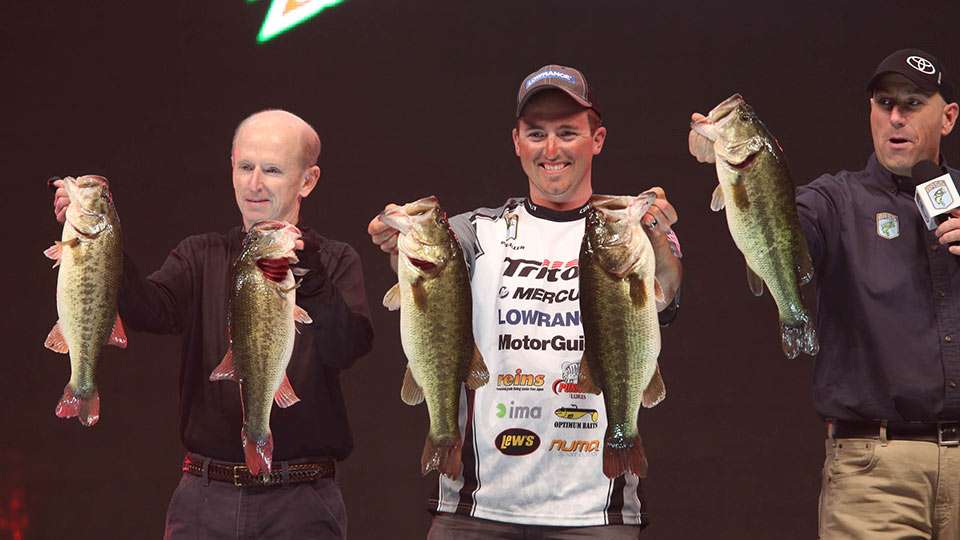     
Paul Mueller finished a pound back in second place, but the B.A.S.S. Nation angler from Connecticut etched his name in the record books with the heaviest single day weight in a Classic. His 32-3 stringer on Day 2 put him in contention, and left him lamenting Day 1 when he only weighed three fish.