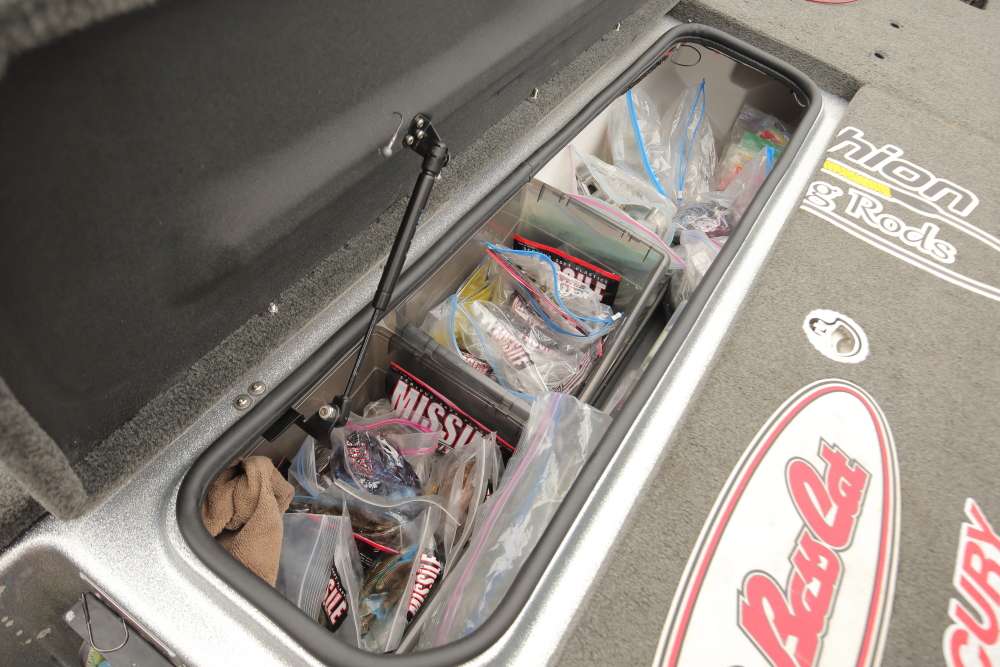 The boat has two center compartments for tackle, including this one that Crews uses for soft baits. As owner of Missile Baits, he has access to a pretty stout selection of soft plastics. 