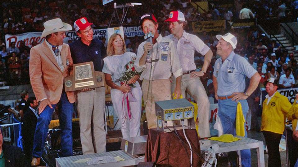 Check out the hats in the perhaps the most famous B.A.S.S. photo of all-time â Rick Clunnâs 1984 Classic victory in Pine Bluff, Ark., with future presidents George Bush (second from left) and Bill Clinton, (second from right) in B.A.S.S. trucker hats. Harold Sharp (right) has his special hat and Ray Scott (left) was in his familiar cowboy hat.