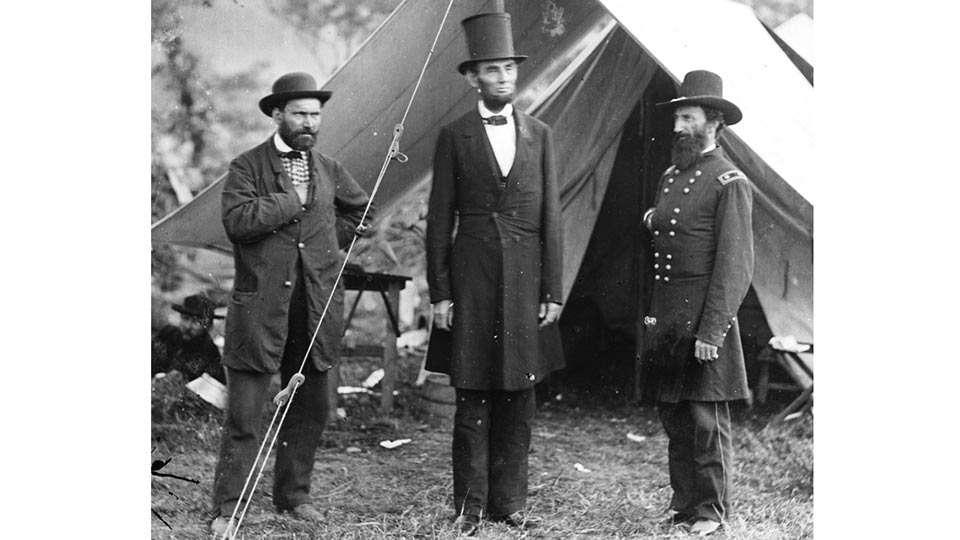 Over the eons, hats transformed into great and small, from Cleopatraâs headdress to the Popeâs mitre to the yamaka. Here Abraham Lincoln wears his distinctive 