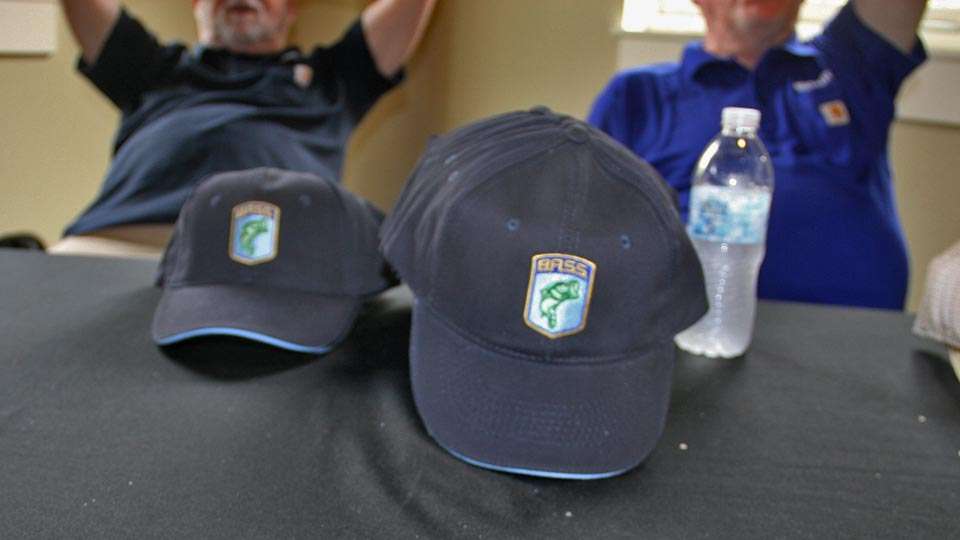 Bassmaster gives out hats to Marshals at Elite events, and the pros also get a selection of giveaway hats at tournaments. Many of those caps wind up signed and given to fans or donated.