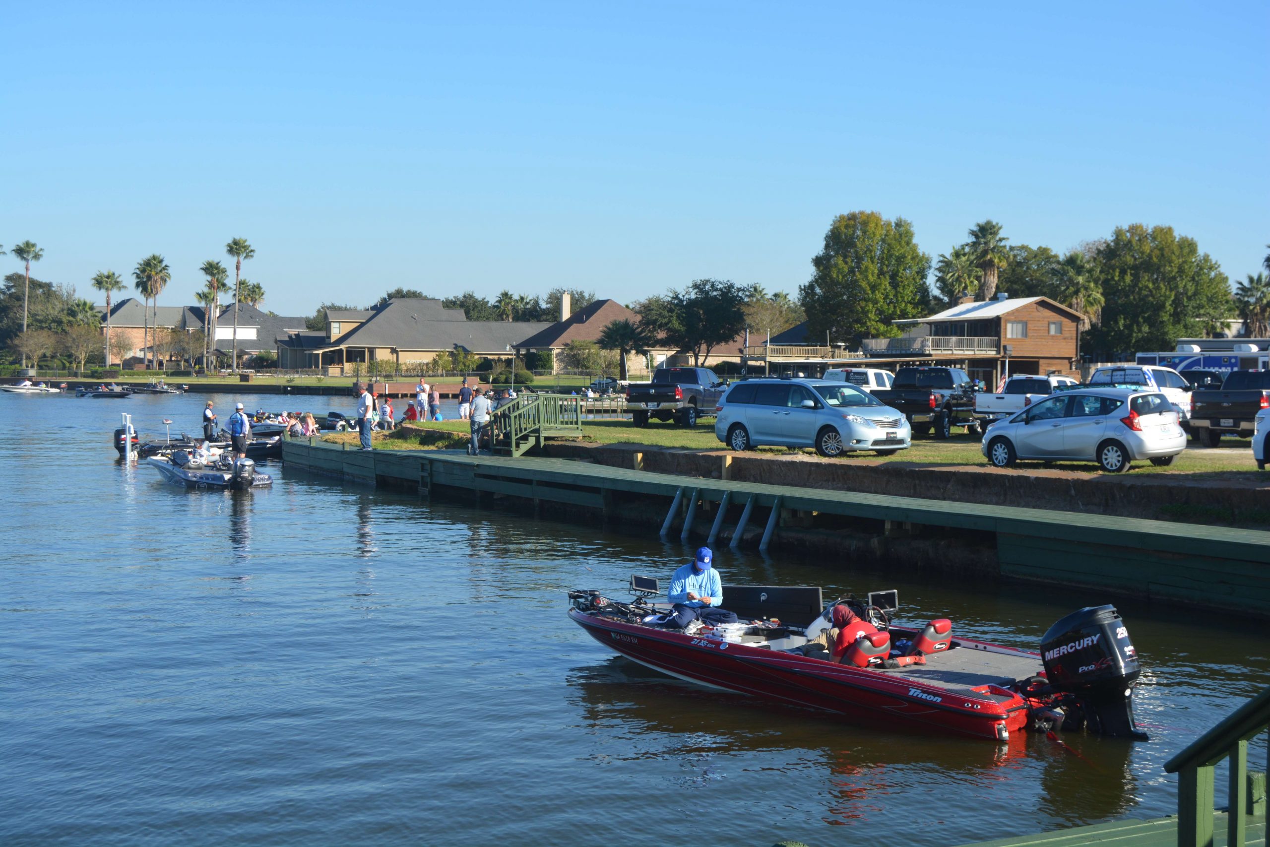The parking lot is full as the last boats come in.