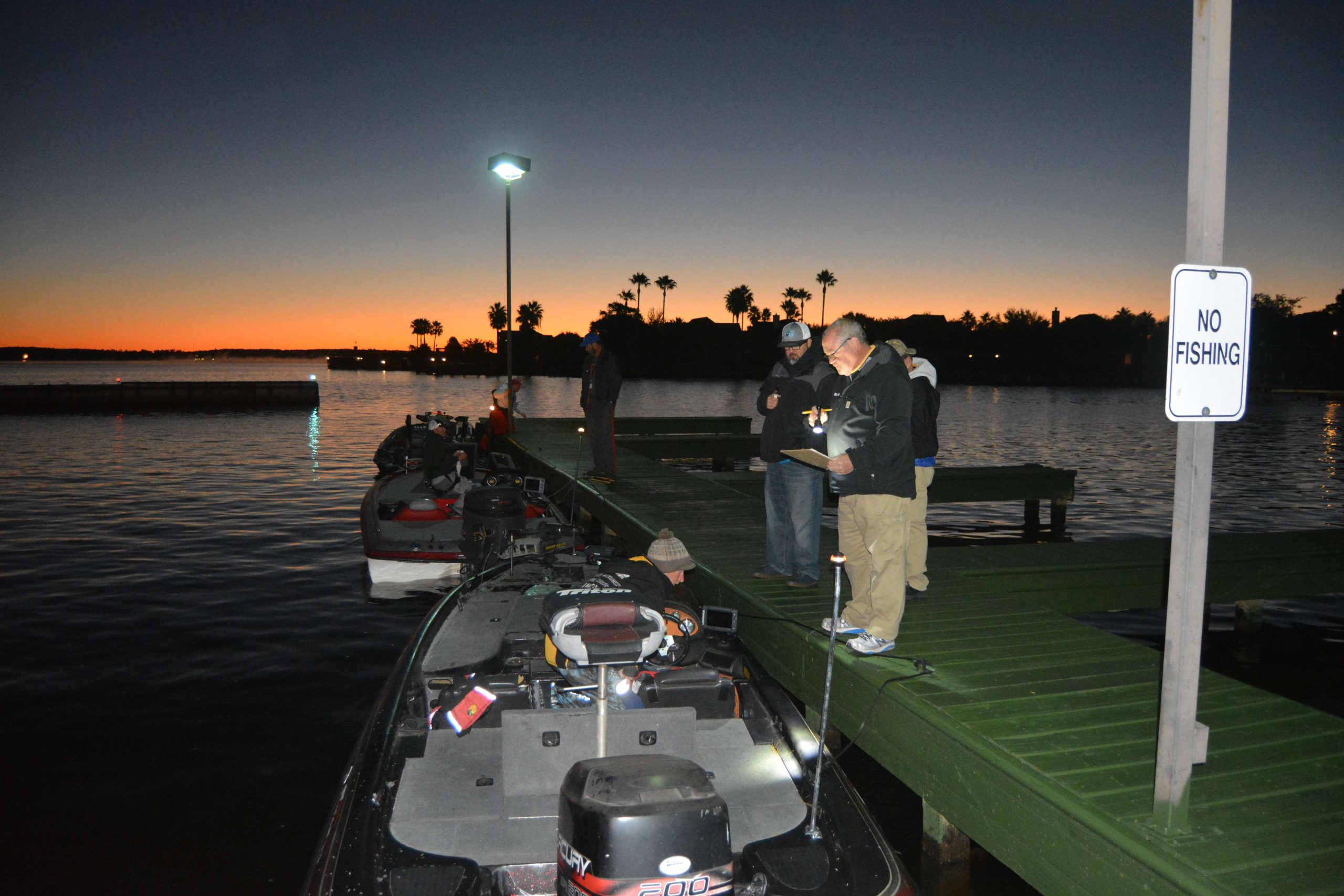 Jason Vaughn of Delaware gets his boat checked in as competitors prepare to launch.