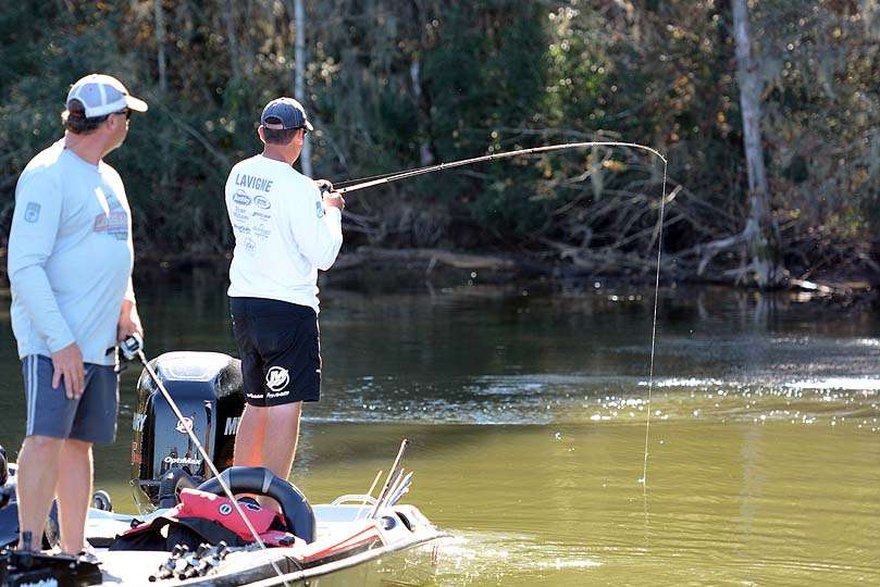 Lavigne gets into action with a bass on the line in the back of a creek. 