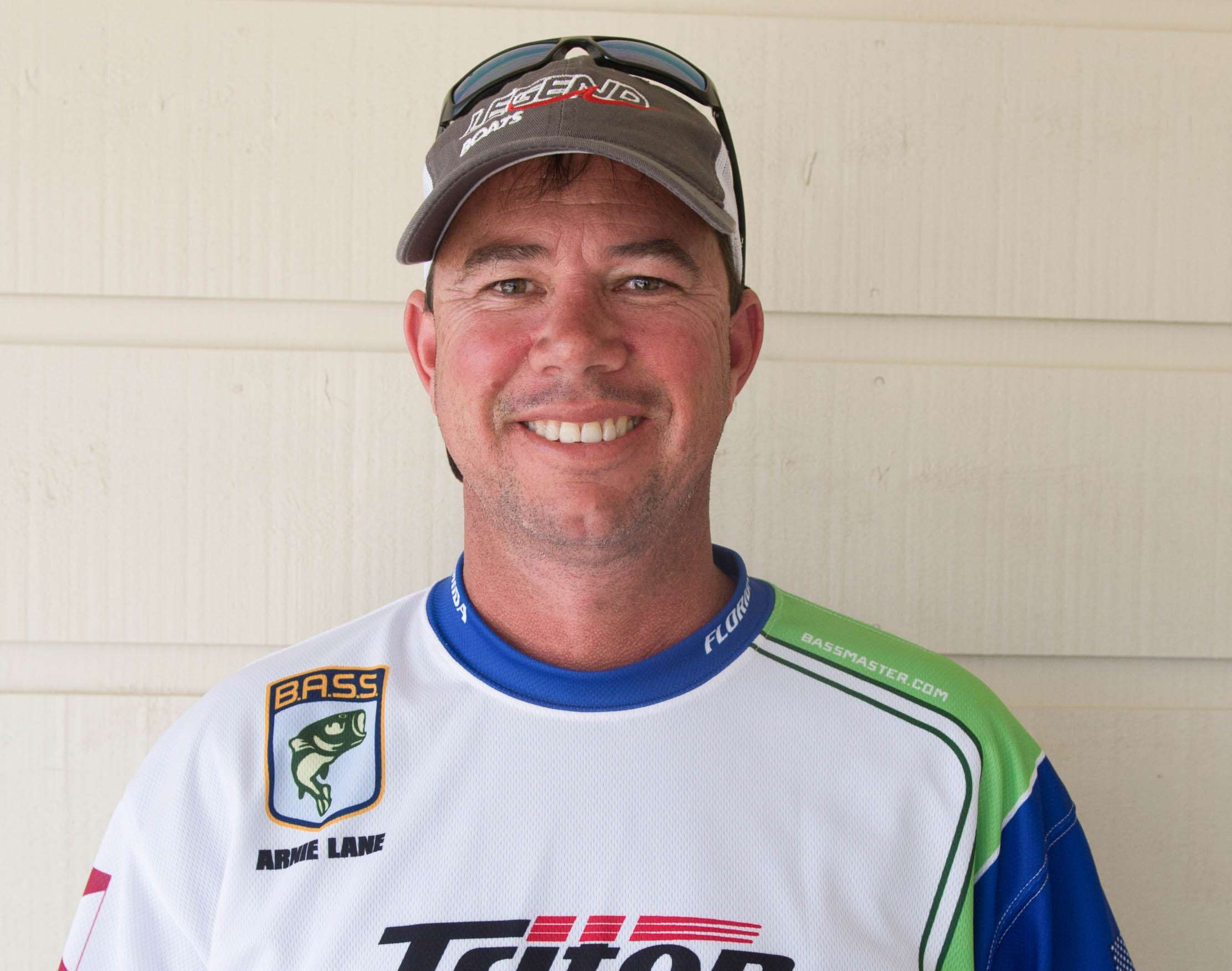 Arnie Lane <br>
Florida Boater <br>
Arnie Lane is well-known in bass fishing circles. If you donât know him from his own reputation winning tournaments, you surely know his Elite Series brothers, Bobby and Chris. Lane is a member of Floridaâs enormous club, the Lakeland Bassmasters. He works in sales, and for fun, he plays golf and cards with family and friends. His sponsors include Power-Pole, Legend Boats, Mercury Motors, Charleston Rubber & Gasket Co., Bobâs Machine Shop, Raymarine Electronics, Costa Del Mar Sunglasses and Reaction Innovations Baits. 