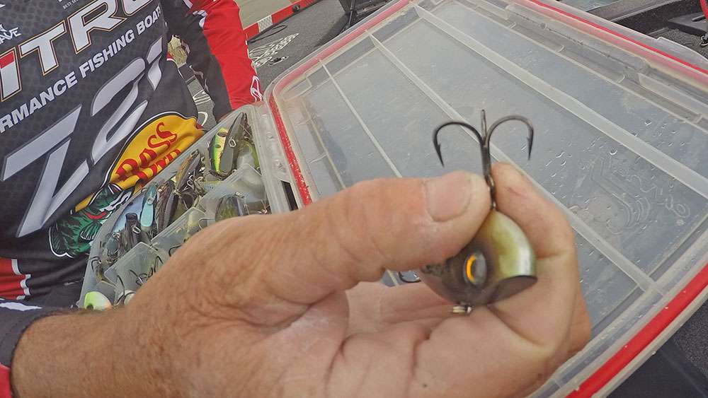 He upgrades the factory hooks to a larger size. He uses Mustad UltraPoint KVD Elite Triple Grip treble hooks. The bigger hooks decrease the number of fish that come unbuttoned during the fight. 