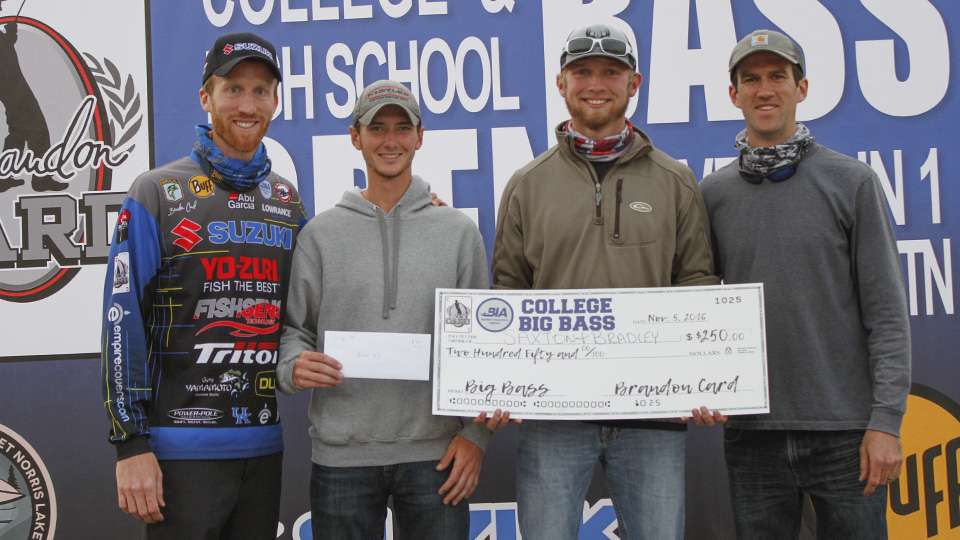 Long and Devaney are presented with their Big Bass money via the college division.