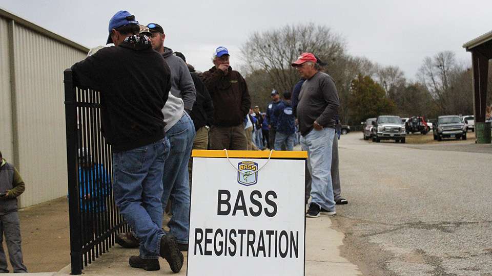 The teams line up outside of the building as they wait for registration to begin.
