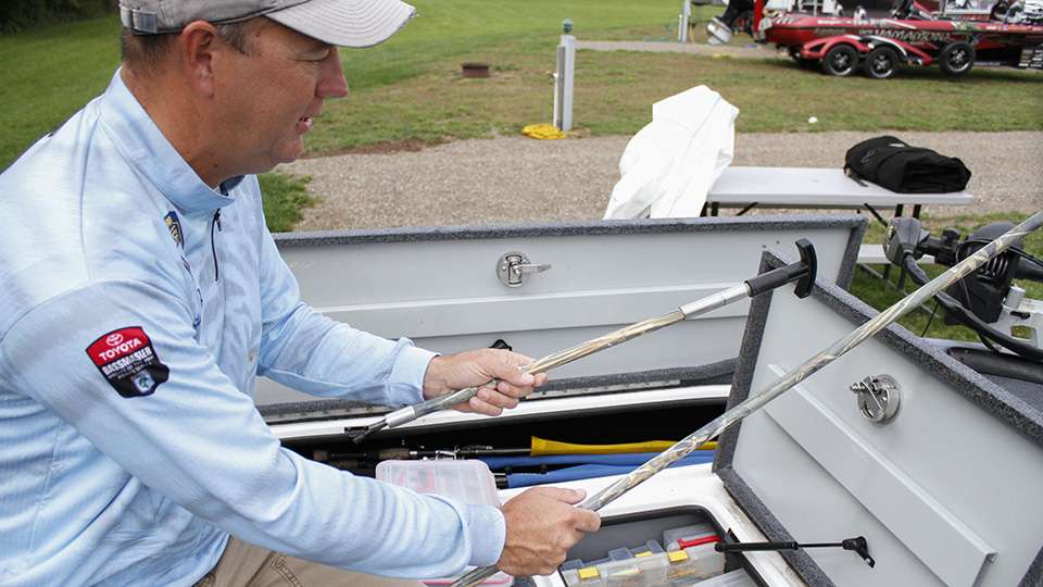 Kennedy reaches in a rod locker and pulls out another interesting addition to his boat.
