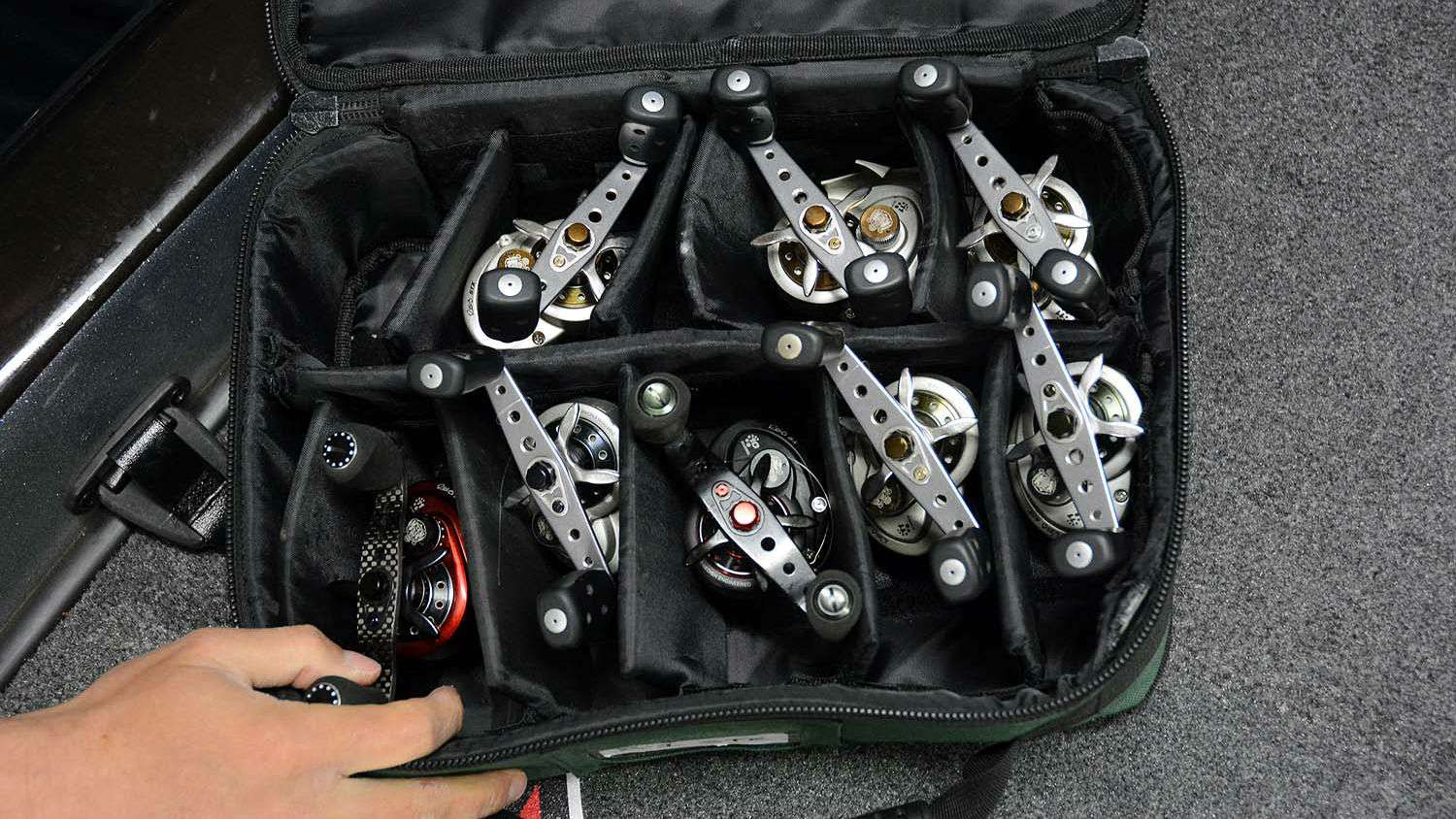 Lucas stores his Abu Garcia reels inside the partitioned compartments. The reels stay organized, clean and ready for easy identification. He likes this bag style because the cover completely opens for better viewing and access. 