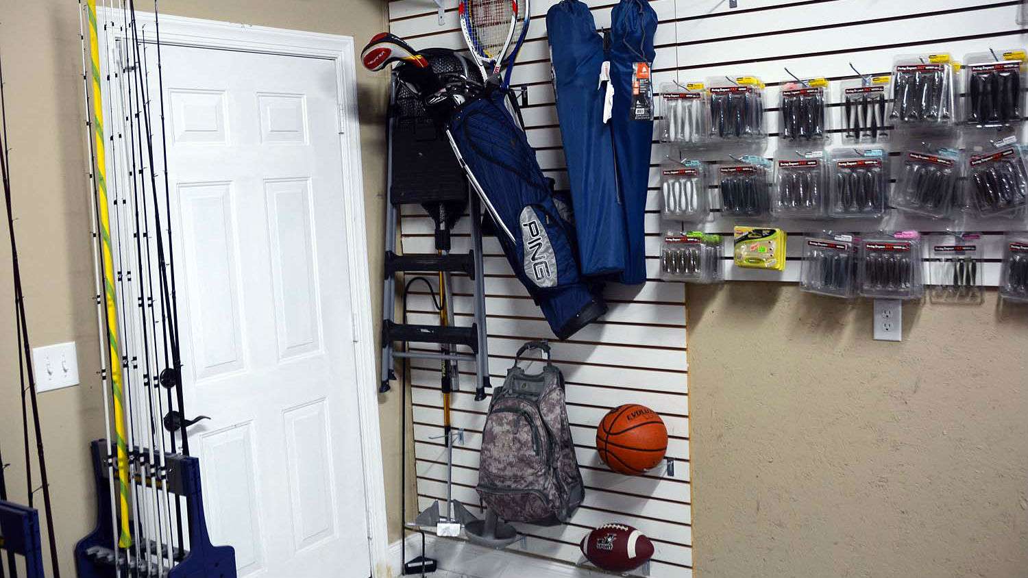 Everything in the Man Cave has its place. That includes gear for recreational fun, like golf clubs and a football. Lucas stays prepared for anything and that includes a game of pickup basketball. 