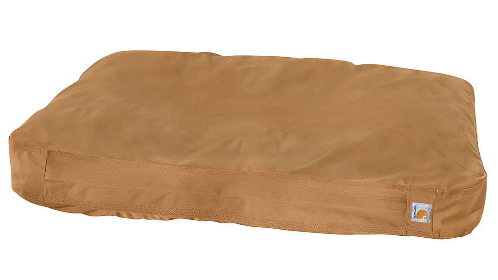 <b>Carhartt Duck Dog Bed</b><br><br>
Itâs a great time to dote on your favorite furry friend, whether he or she is a duck fanatic or not, all dogs like getting wet and dirty, so the right kind of bed will keep the wet-dog smell at bay. Well, mostly. The bed is 100 percent with a removable interior cushion and upcycled nylon polyester padding. It is enclosed with a classic brass zipper with a  flap. There are two sizes and two colors. $59.99-$69.99
<br><br>
 <a href=