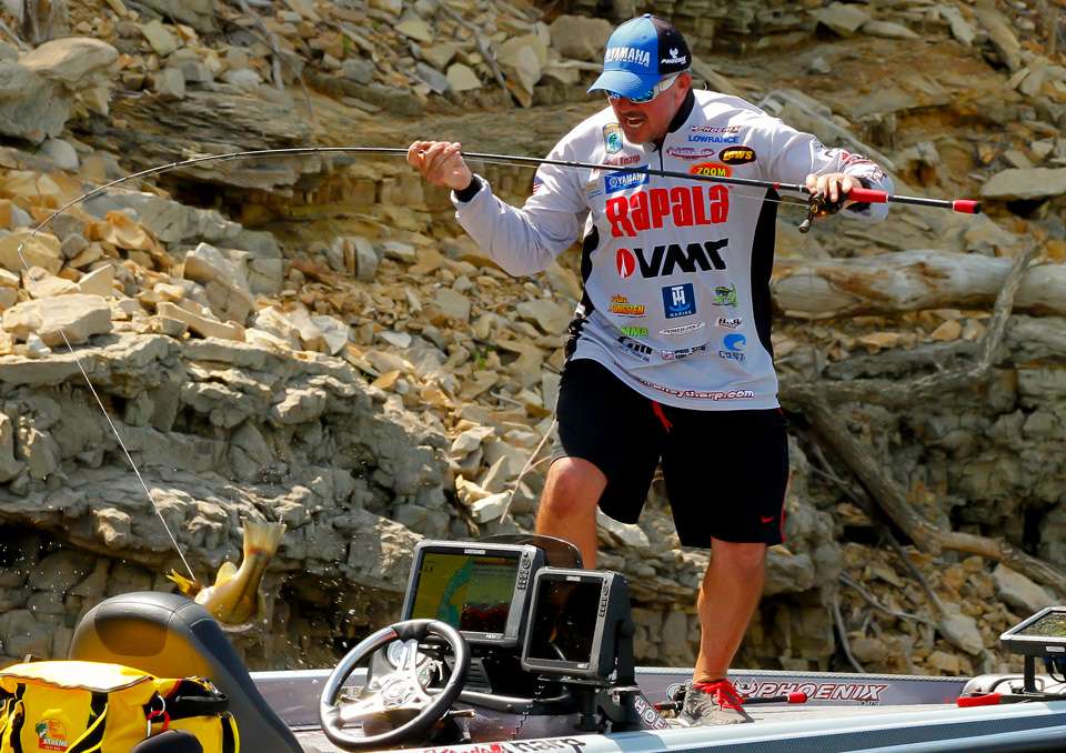 Tharp stuck with flipping and pitching a jig all day, and caught his largest keeper in final five minutes of the tournament. While the fish was still being lowered into the bottom of the boat...