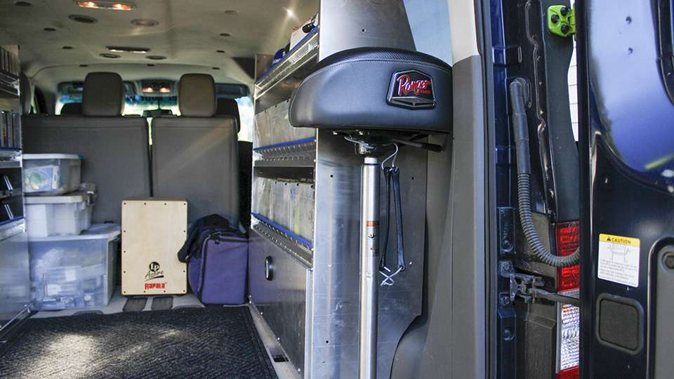 He has a bungee to keep his pedestal seat fastened in the back of his van for easy access too.
