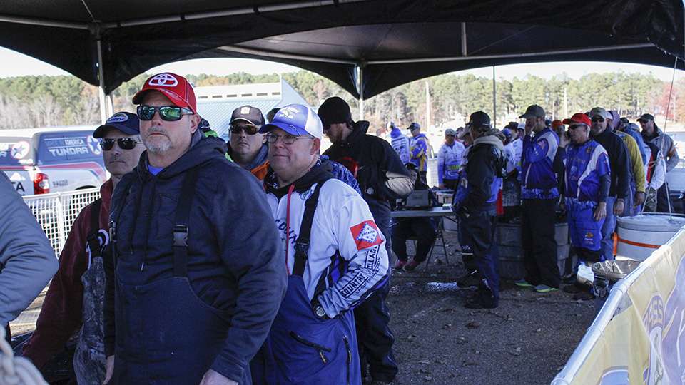 Anglers gather at the tanks prior to the start of the weigh-in.