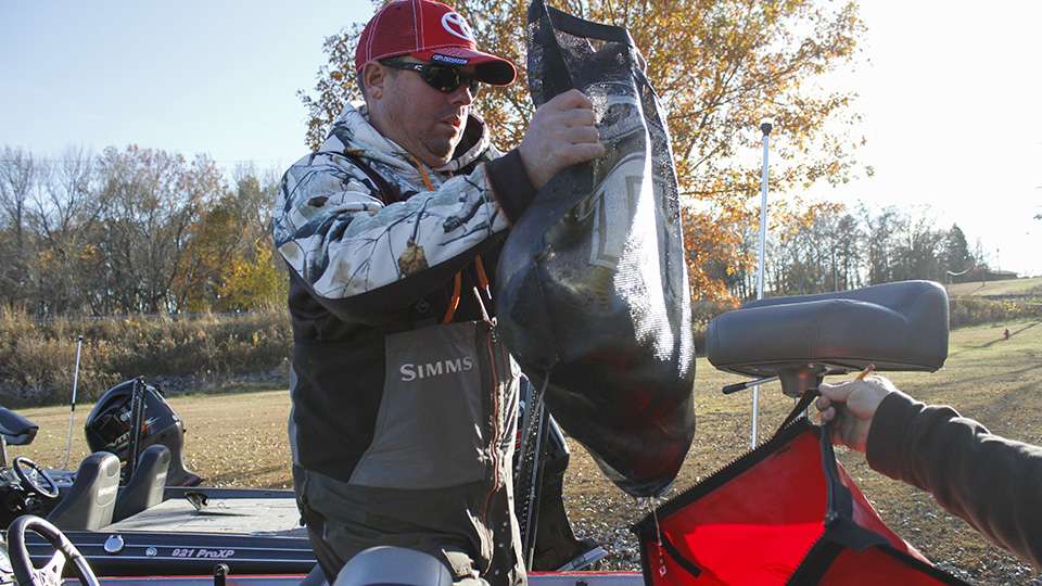 Scott Clift, Ashely Medley's team partner, bags up his fish and heads to the scales. Word from the water is he had a good day.