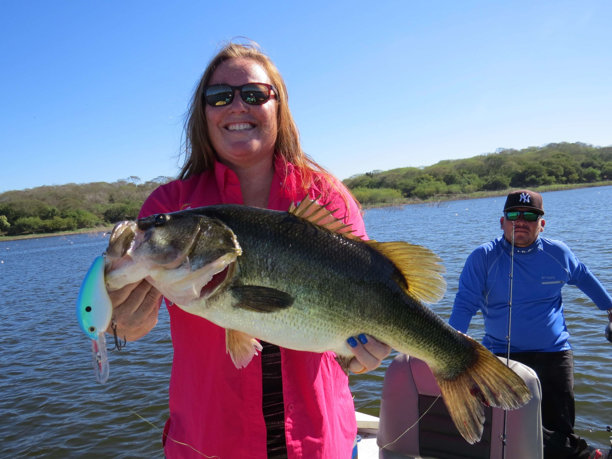 Hanna Robbins with her first fish on the big Strike King 10XD crankbait.