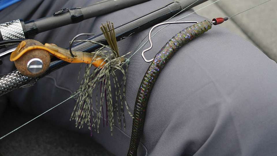 Hudnall probed a mix of lily pads and hydrilla using a 6-inch Bass Pro Shops Stick-O, green pumpkin/violet flake. To that he rigged a 4/0 Trapper Tackle Offset Wide Gap Hook with 1/8-ounce red color weight. Alternatively, he used an unnamed green/pumpkin 1/2-ounce swim jig rigged with a Missile Baits Twin Turbo trailer, Bamer Craw pattern. 