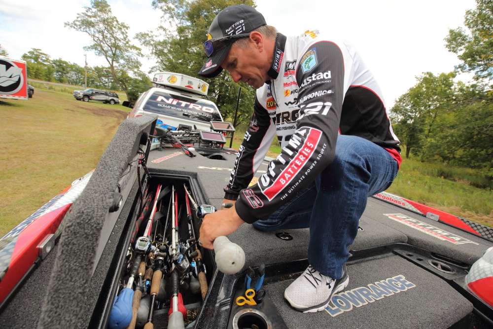 They are all Bass Pro Shops rods and reels. The rods are CarbonLites, Crankin' Sticks and Johnny Morrises. The reels are all Bass Pro Shops Titanium Reels, and they are spooled with Bass Pro Shops fluorocarbon, monofilament or braid. 