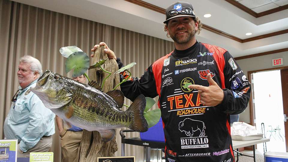 Second-year Elite Series pro John Hunter poses with a huge Florida bass and hopes to reel that in tomorrow or at some point this week.