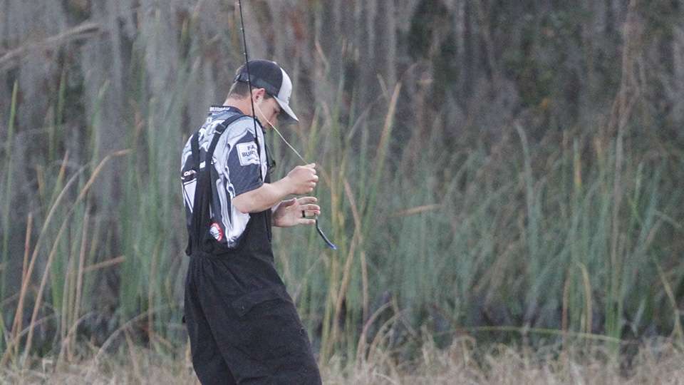 But he loses the fish and watches as it swims back towards its bedding area.