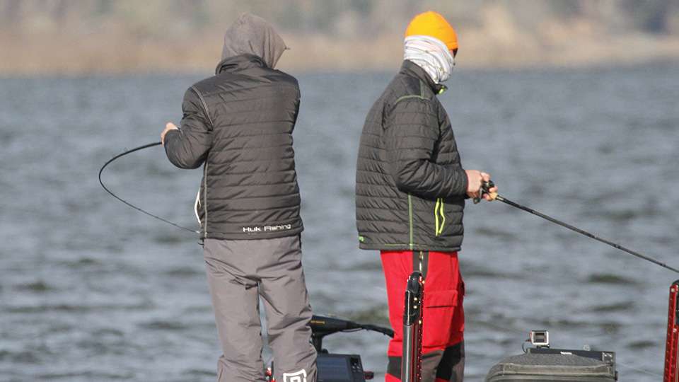 Travis McGuire and Layne Bynum were keeping their head in the game as they stayed focused despite boat traffic and the cold north wind that was coming down the lake.