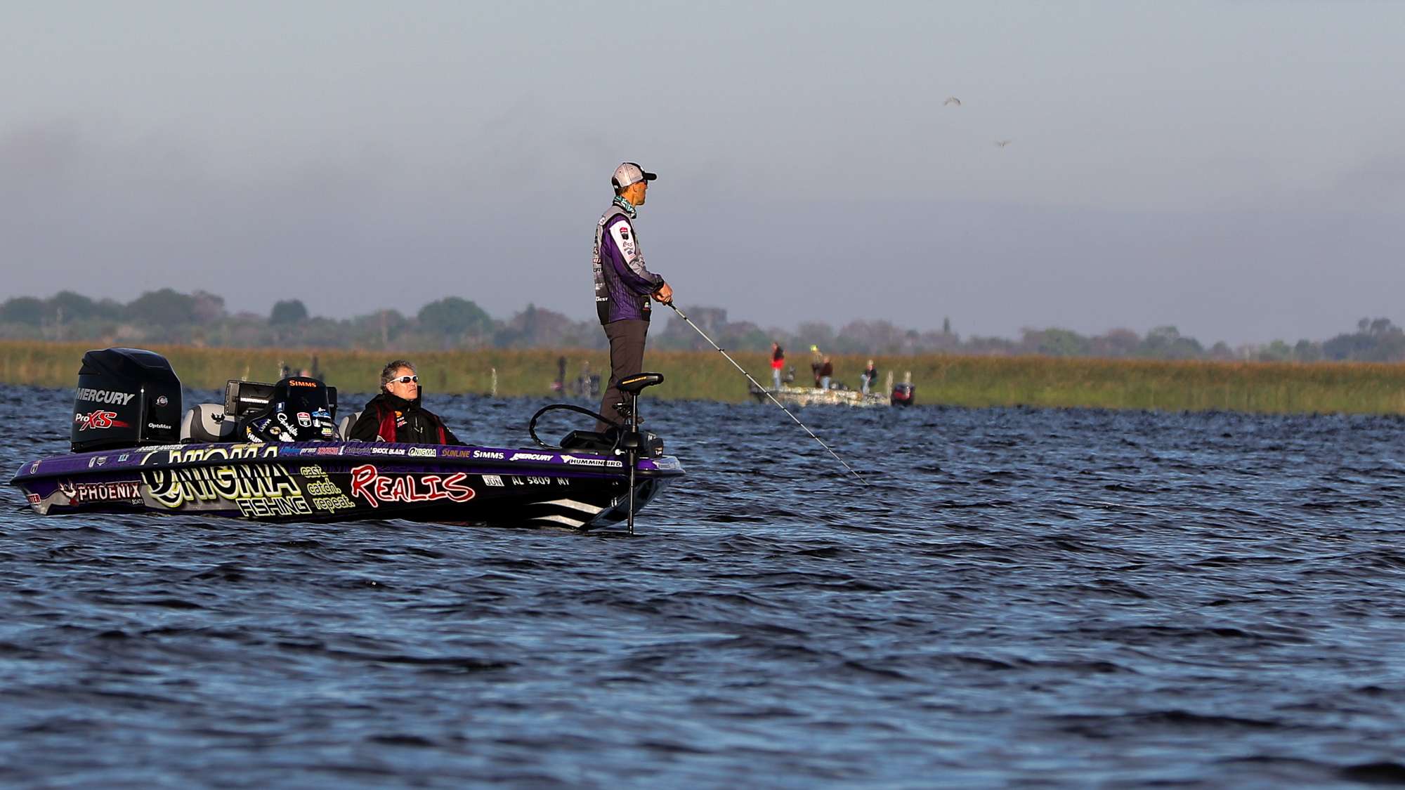 Day 1 begins on the A.R.E. Truck Caps Bassmaster Elite on Lake Okeechobee and we are immediately surrounded by Elite Series anglers like Aaron Martens.