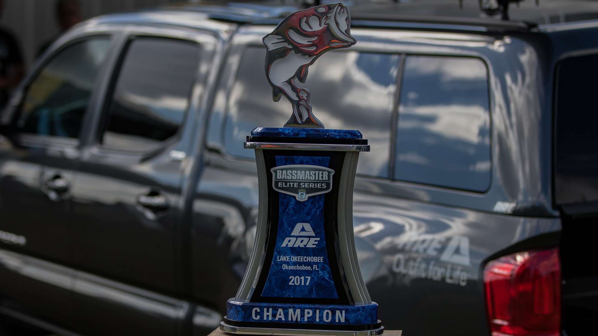 The trophy sits at the A.R.E. Truck Caps booth, waiting to find a new home tomorrow.
