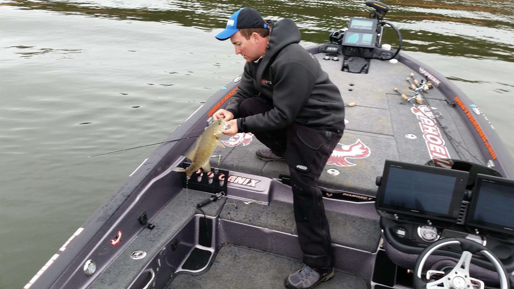 After four fish that didn't help the cause, Paul Mueller culls up another quarter pound.  Trying to make the Top 12 cut.