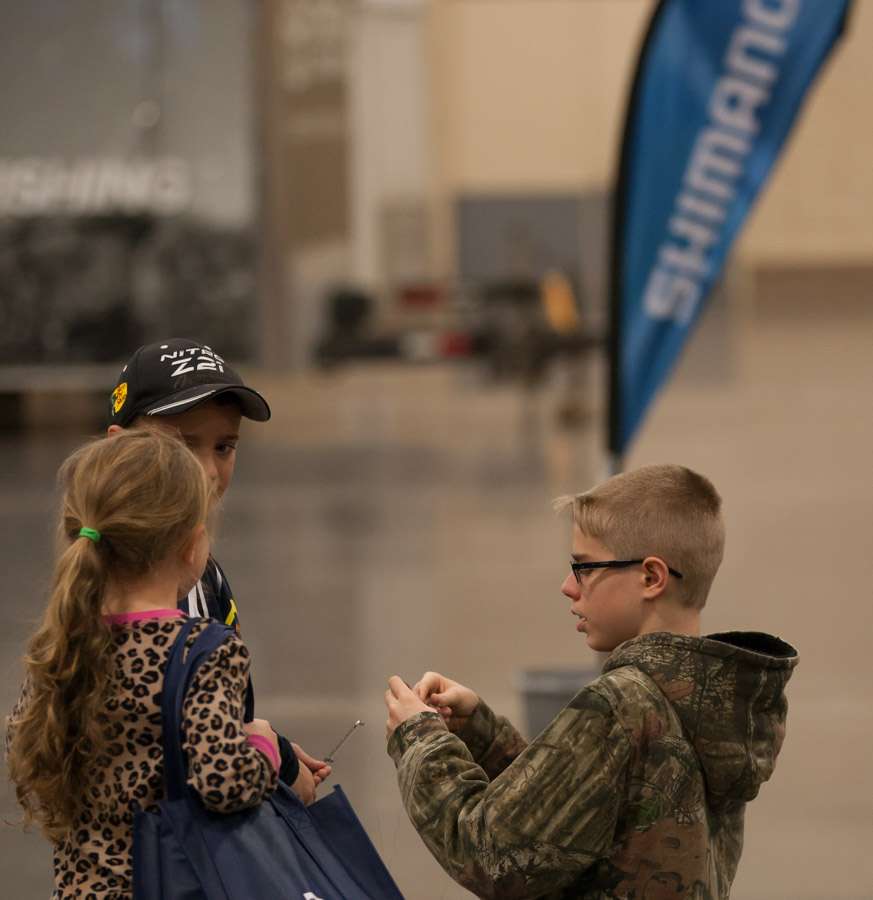 A helping hand at the Shimano Casting demo area.  Itâs a busy place here at the Expo.
