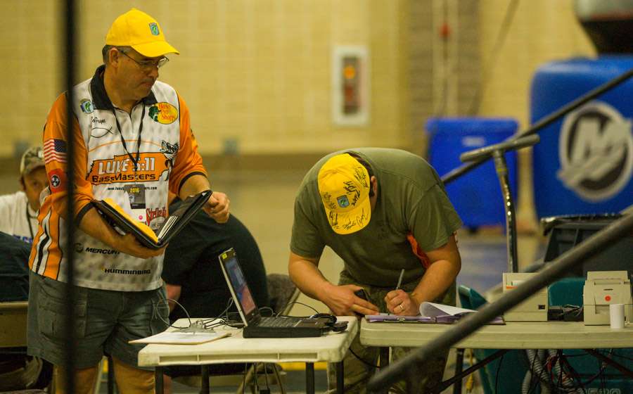 The many volunteers are working hard behind the scenes to prepare for the weigh-in. 
