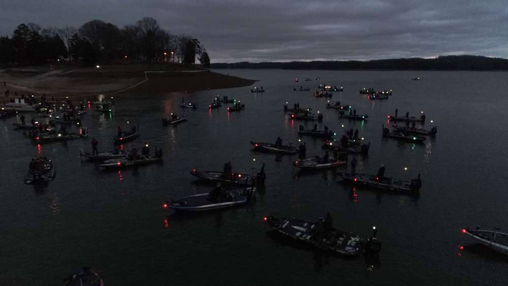 Anglers crowded the launch site as the National Anthem played before sunrise. 
