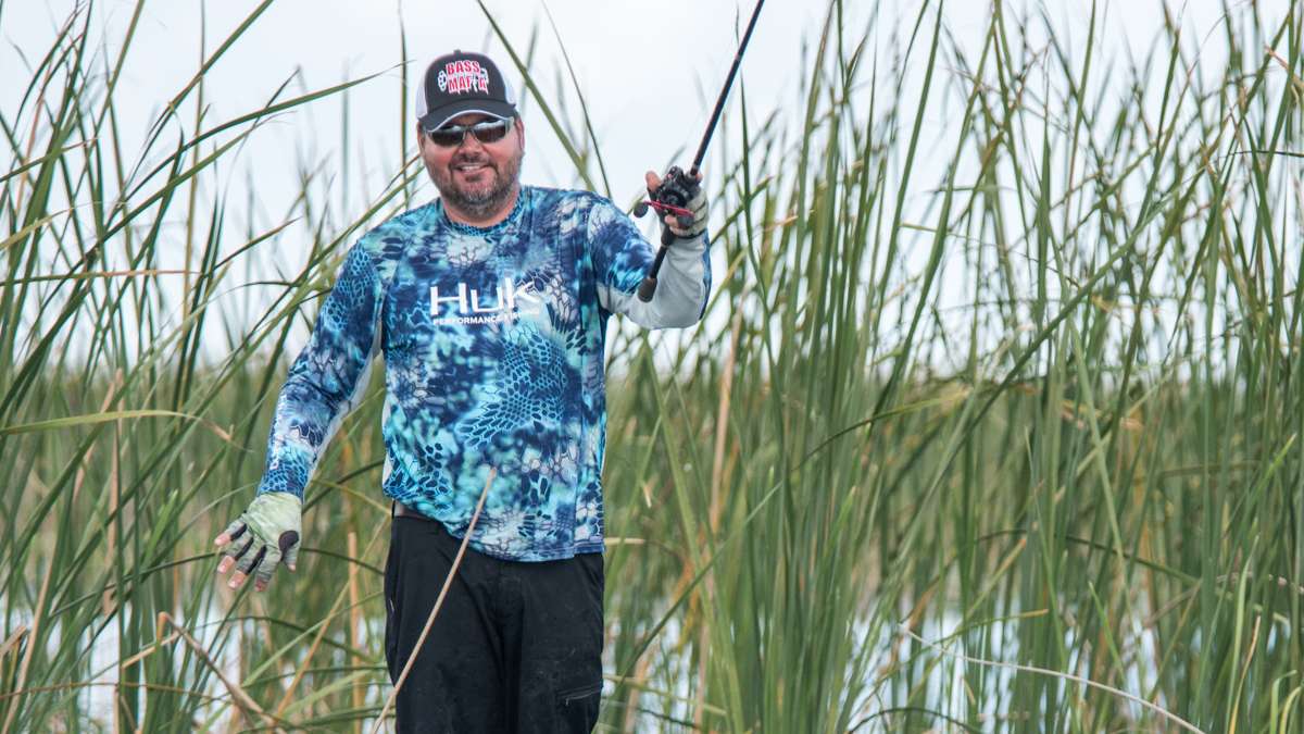 The smile of a man who knows heâs fishing around giants.