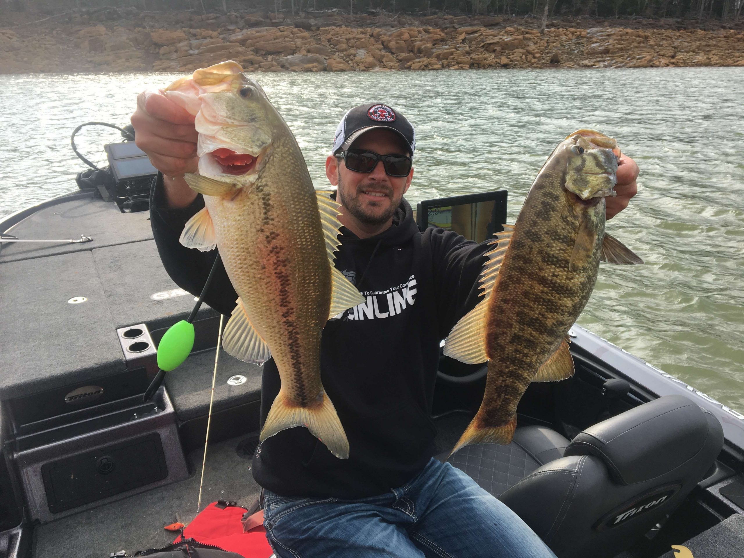 David Mullins culls out smallmouth with largemouth.